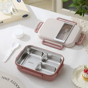 Three-grid 304 stainless steel bento box in pink and beige with portable utensils
