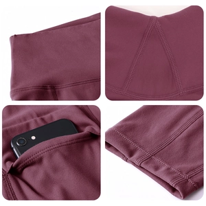 Macro-detail van de yoga legging met hoge taille, zijzakken en gladde platte naden