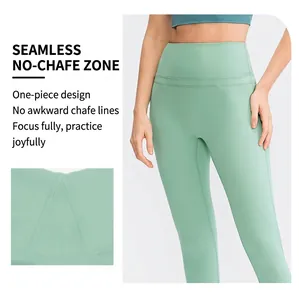 Detail view of high waisted yoga pants showing seamless crotch and elastic fabric texture