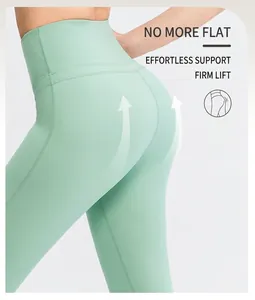 Detail showing high-waist yoga leggings with booty-lifting seams in mint green
