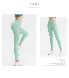 Front and side view of mint green high-waisted yoga pants with seamless fit and push-up effect