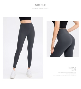Macro view of high-waisted seamless dark grey yoga pants with push-up effect