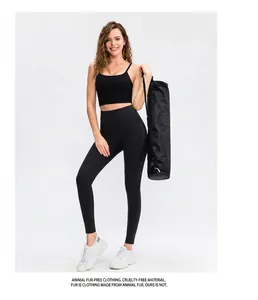 Detail of high waist seamless yoga leggings with athletic sports bra and yoga mat bag