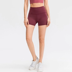 Women's high-waisted burgundy yoga shorts made of stretchy fabric for fitness and running