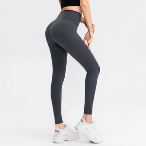 High-waisted dark grey yoga leggings for women with seamless front and lift-up effect