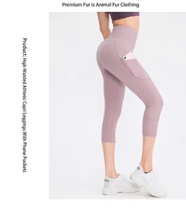 Detail view of high-waist lavender yoga capris featuring a functional side phone pocket
