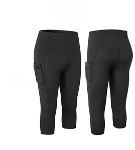 Detail view of high-waist cropped yoga leggings with side pockets and elastic fabric