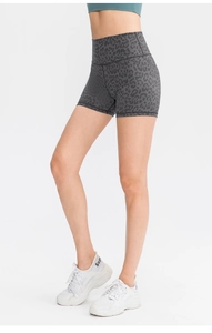 Detailed side view of high-waisted leopard print yoga shorts with seamless stitching