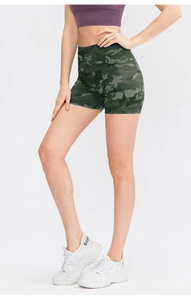 Detail shot of camo yoga shorts showing high-waist band and stretch athletic fabric