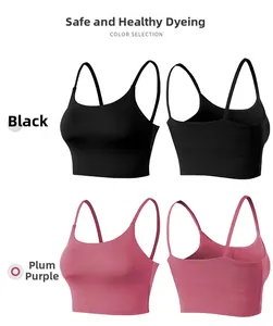 Detail view of black and plum purple slim fit yoga tank tops with thin straps