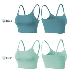 Front and back views of ribbed yoga tank tops in blue and mint green with pads
