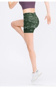 Side view of high-waisted camo yoga shorts on a female model in a running pose