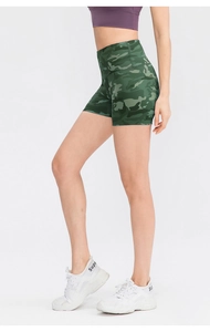 Close-up of high-waist camo yoga shorts showing side fit and elastic fabric texture