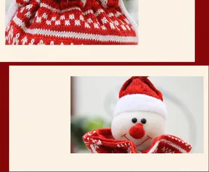 Detail of knitted Christmas drawstring bag with 3D snowman doll and snowflake pattern