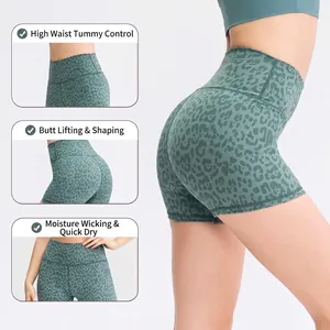 Women's green camo high-waisted yoga shorts with tummy control and quick-dry fabric