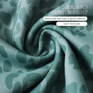 Green leopard print yoga shorts with moisture-wicking and cooling stretch fabric