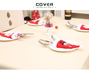 Christmas silverware holder featuring a mini Santa hat design for holiday table settings