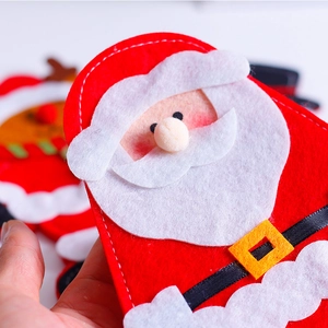 Portaposate di Babbo Natale in feltro rosso per decorazione tavola e regali di Natale