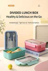 Three-compartment bento box set in blue pink and green with cutlery storage detail