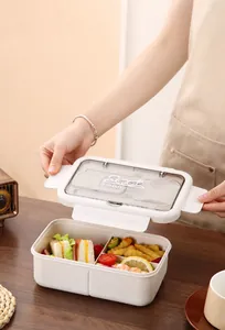 Détail du couvercle de la boîte bento avec rangement couvert et clips de verrouillage