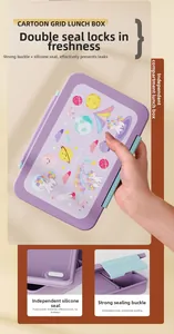 Detail of purple bento lunch box showing leak-proof silicone seal and unicorn patterns