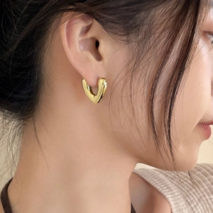 Elegant gold-tone heart-shaped chunky hoop earrings for women with mirror finish