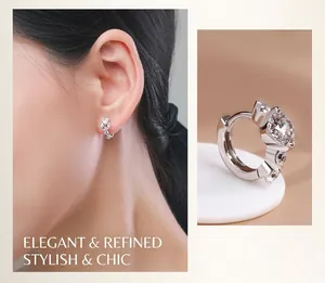 Detail of silver hoop earrings with round cut sparkling stones on model and macro view