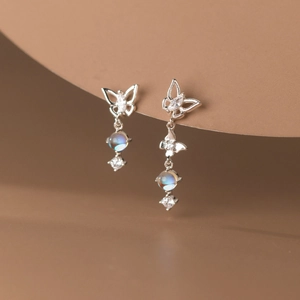 Asymmetric S925 silver butterfly drop earrings with moonstone accents and crystal details