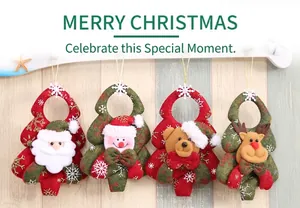 Detail showing four 3D fabric Christmas tree ornaments with Santa and elk on wooden background