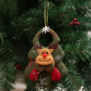 Handmade reindeer Christmas tree ornament with 3D red nose hanging on green branches