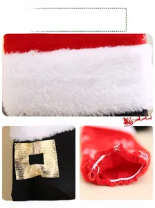 Close-up of red knit Christmas chair leg covers with faux fur trim and gold sequins