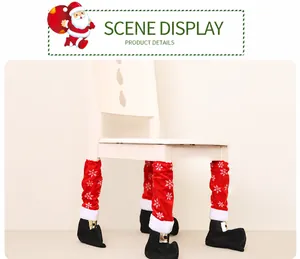 Detail of red Christmas chair leg covers with snowflake patterns and black boot design