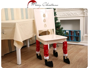 Red Christmas chair leg covers with white snowflake patterns and elf shoe design