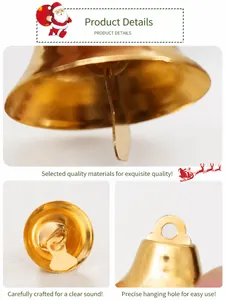 Macro detail of golden Christmas bells with hanging loops and metal internal strikers