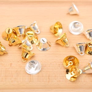 Polished gold and silver metal Christmas bells with hanging loops for holiday tree decor