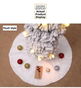 Close-up of white faux fur Christmas tree skirt with dense plush texture on burlap