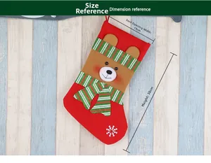 Detailed view of red plush Christmas stocking with cute brown bear and size measurements