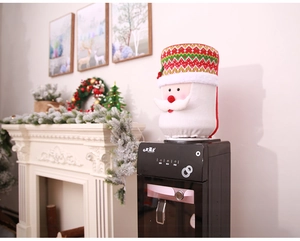 Detailed view of a plush Santa Claus water dispenser cover in festive holiday setting