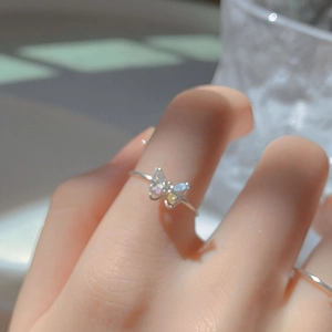 Chic 3D butterfly ring with colorful cubic zirconia stones worn on a hand model
