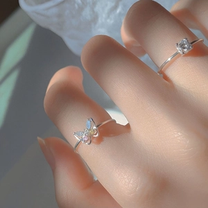 Elegant butterfly zircon rings set in silver finish featuring pink and blue stones