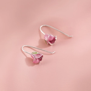 Elegant pink tulip flower drop earrings on soft silk background for a classic French style