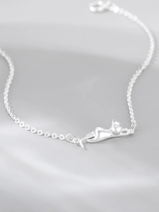 Minimalist S925 sterling silver kitten bracelet featuring a matte stretching cat pendant