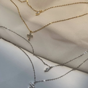 S925 silver double layered cross necklace with sparkling cubic zirconia in gold and silver
