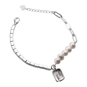 S925 silver bracelet featuring white pearls and a Good Luck rectangular pendant charm