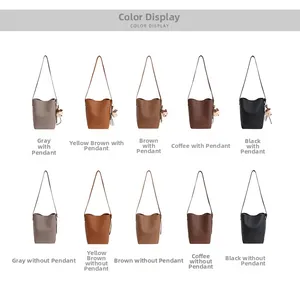 Color display of minimalist bucket bags in grey, tan, brown, coffee, and black options
