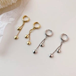 Élégantes boucles d'oreilles cœur à pampilles en argent S925 sur papier artistique