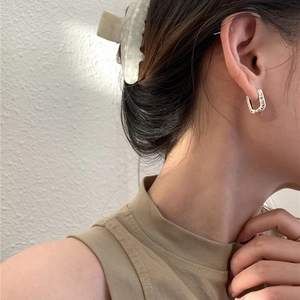 Vintage S925 silver U-shape hoop earrings with graffiti engraving on female model