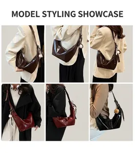 Three colors of glossy faux leather crescent hobo bags shown on model for style reference