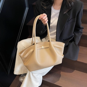Chic beige underarm tote bag with lychee leather texture and metal buckle detail