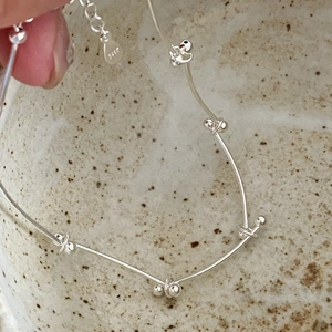 Minimalist S925 sterling silver beaded chain bracelet with polished finish for women